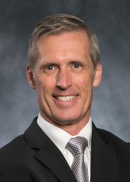 Kevin Klauer, D.O., in a dark suit
