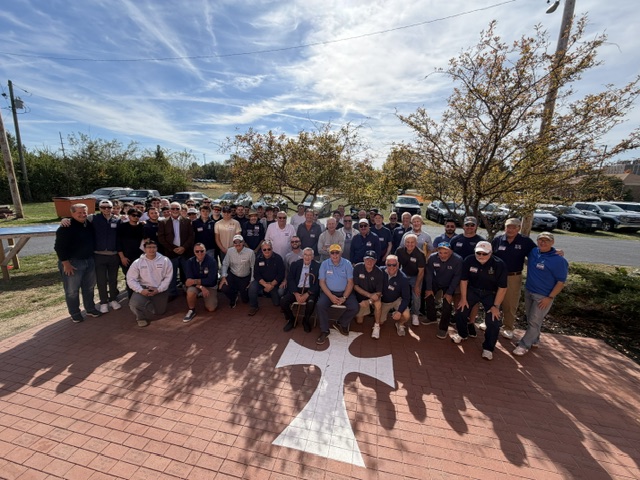 Eta Mu brothers gathered on the Recognition Patio around the White Cross at 2103