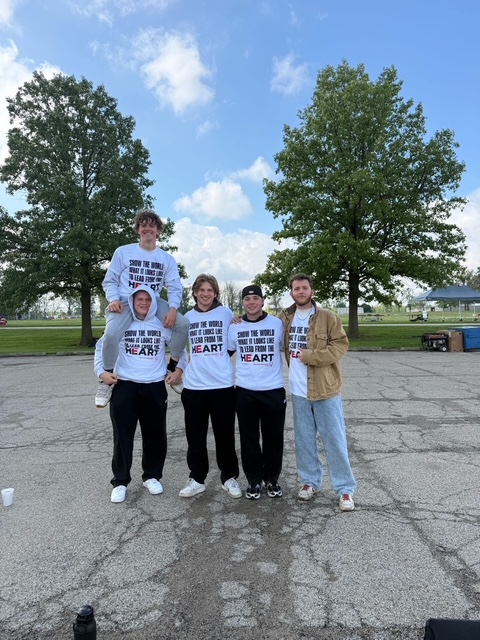 Eta Mu brothers participating in a philanthropic service event